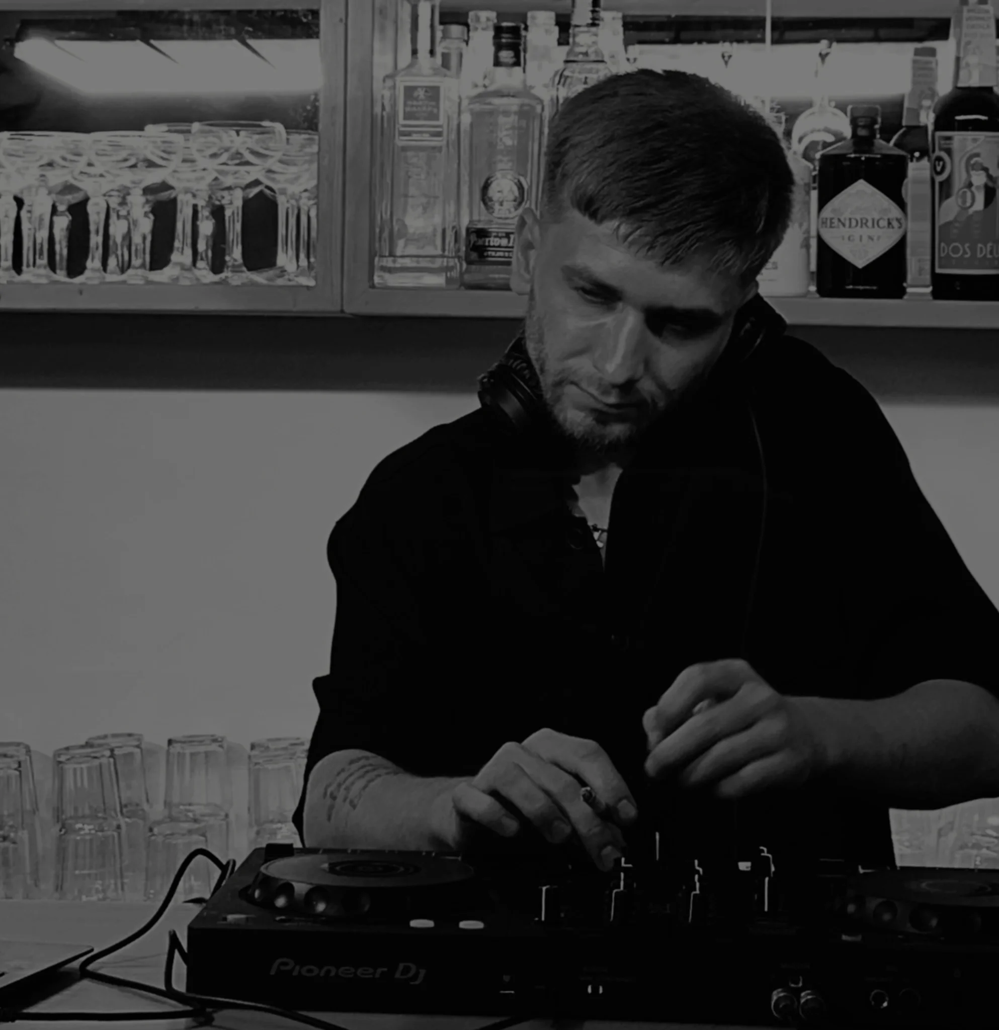 ROS DJ Rostyslav Dabizha Ukrainian DJ brand logo and professional DJ setup at electronic music festival